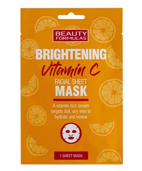 Beauty Formulas Brightening Vitamin C Facial Sheet Mask lying flat on a clean white surface, ready for skincare use.