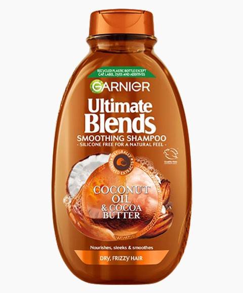 Garnier Ultimate Blends Coconut Oil Cocoa Butter Smoothing Shampoo bottle with a coconut and cocoa butter background.