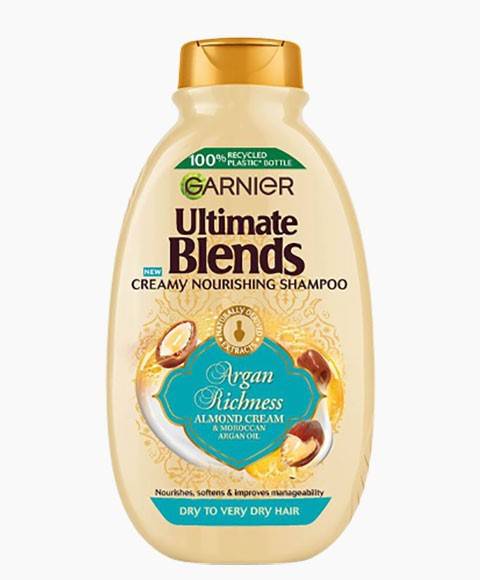Garnier Ultimate Blends Argan Richness nourishing shampoo bottle with a label featuring argan oil and creamy formula.