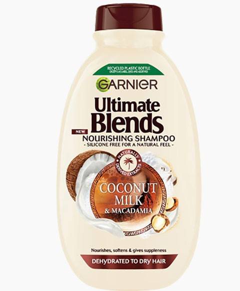 Garnier Ultimate Blends Coconut Milk and Macadamia Nourishing Shampoo bottle with a white and coconut-themed label.