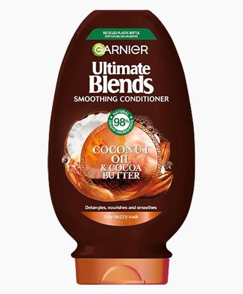 Garnier Ultimate Blends Coconut Oil Cocoa Butter Conditioner bottle with a smooth, creamy texture and tropical scent.