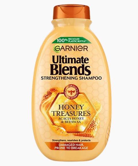 Garnier Ultimate Blends Honey Treasures strengthening shampoo bottle with honey and natural ingredients for healthy hair.
