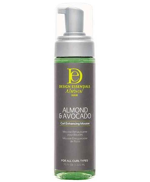Design Essentials Natural Curl Enhancing Mousse in a pump bottle, ideal for defining and styling natural curly hair.