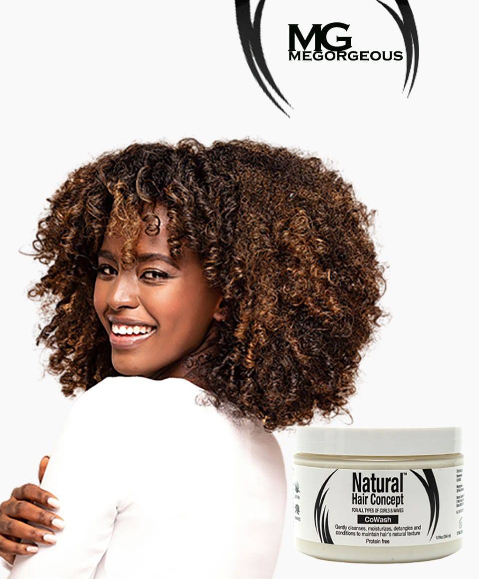 Me Gorgeous Natural Hair Concept Co Wash shampoo in a bottle with a sleek design, surrounded by fresh leaves.