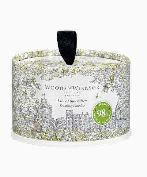 Woods of Windsor Lily of the Valley dusting face powder in a decorative container with floral design, suitable for gentle face application.
