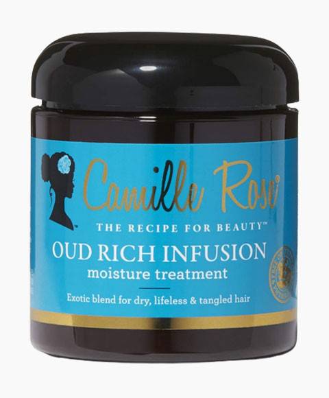 Camille Rose Naturals Oud Rich Infusion Moisture Treatment for hair, showing the product bottle with a textured label.