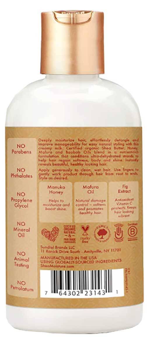 Shea Moisture Manuka Honey and Mafura Oil conditioner bottle, hydrating leave-in milk for nourishing hair care.