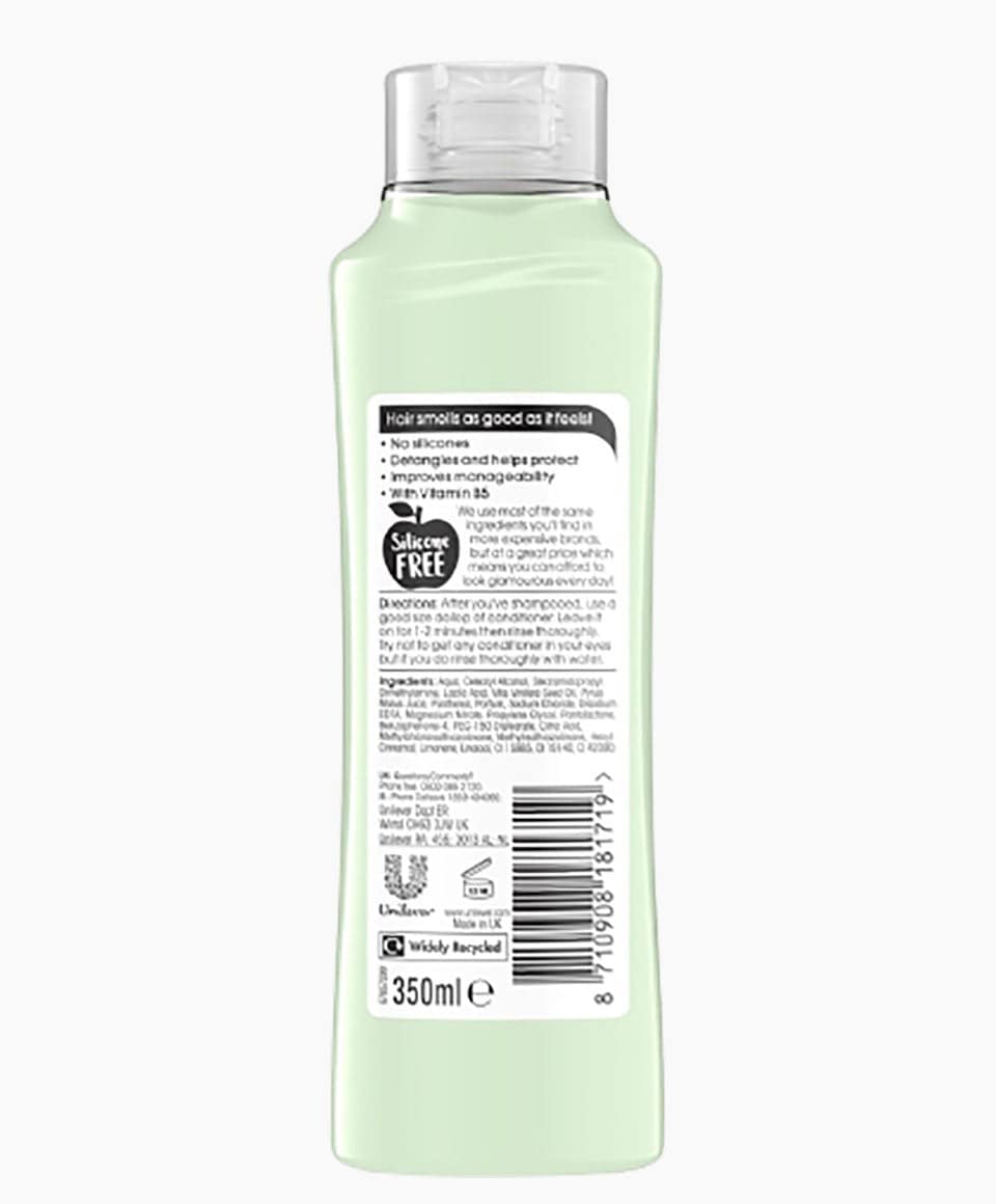 Alberto Balsam Juicy Green Apple refreshing conditioner bottle with green apple imagery and product label.