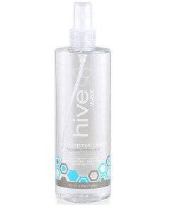 Hive Wax Equipment Cleaner bottle with label, showcasing cleaning solution for wax equipment in a clear container.