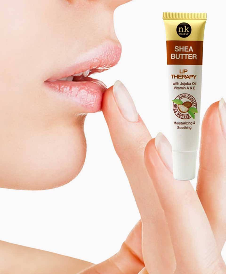 NICKA K NEWYORK NK Shea Butter Lip Therapy tube, moisturizing lip care product with smooth, creamy texture and natural Shea butter.