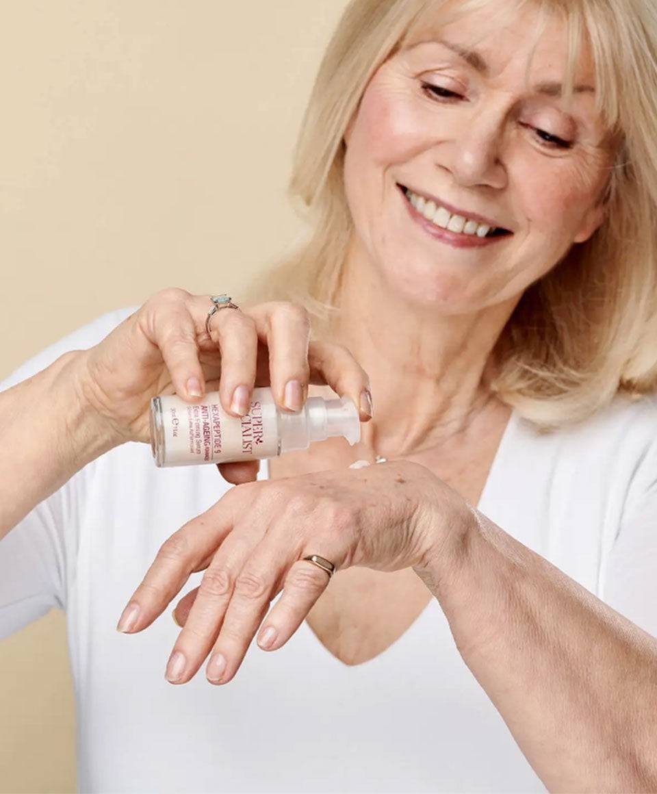 Super Facialist Hexapeptide 9 Anti-Ageing Extra Firming Serum moisturizer bottle, highlighting skincare for anti-aging and firming.