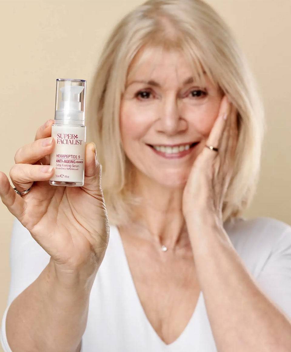 Super Facialist Hexapeptide 9 anti-aging firming serum in a moisturizer bottle, showing the product label and packaging.