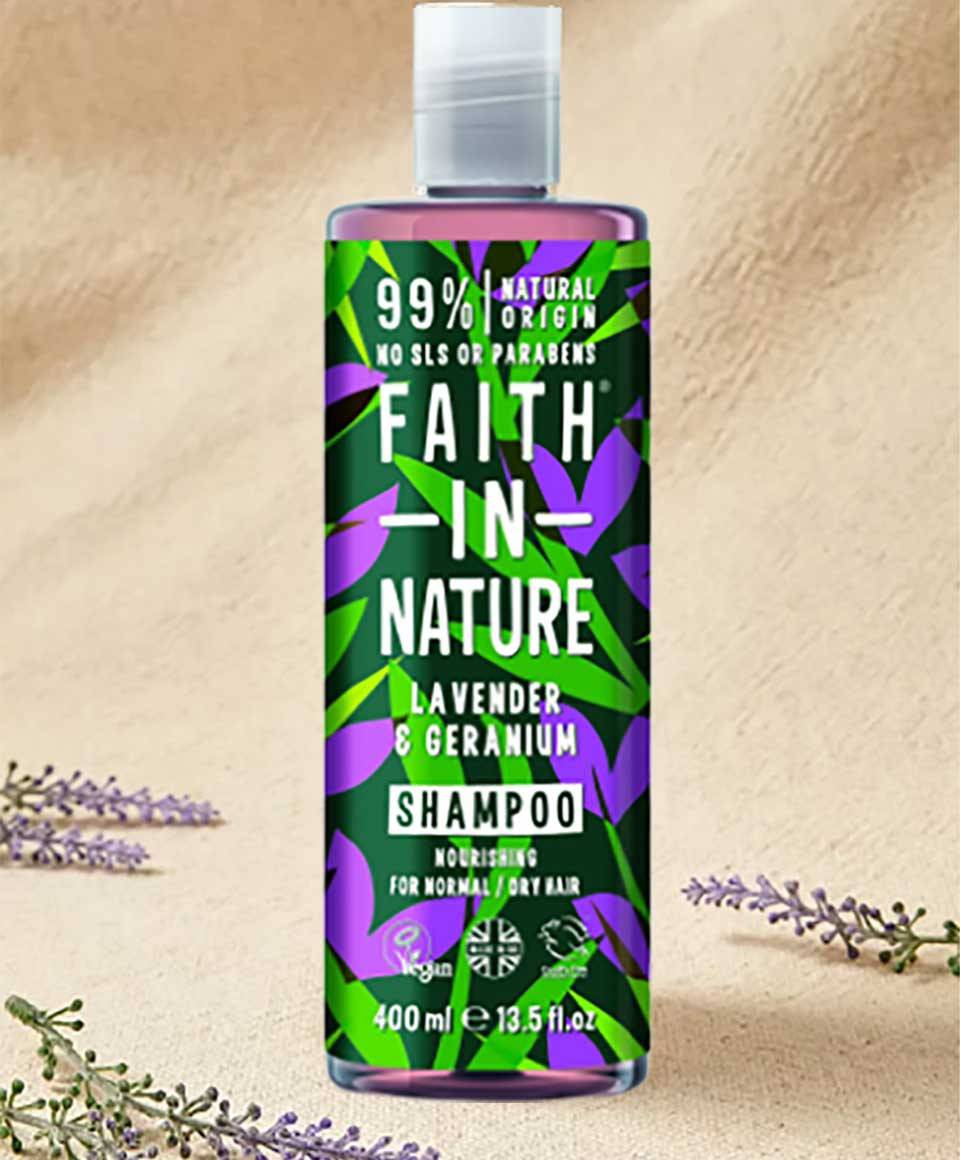 Faith In Nature Lavender & Geranium shampoo bottle showing floral ingredients and natural packaging for gentle hair cleansing.