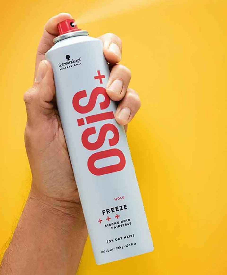 Schwarzkopf Osis Plus Hold Freeze strong hold hair spray bottle with a spray nozzle, designed for firm styling and hold.