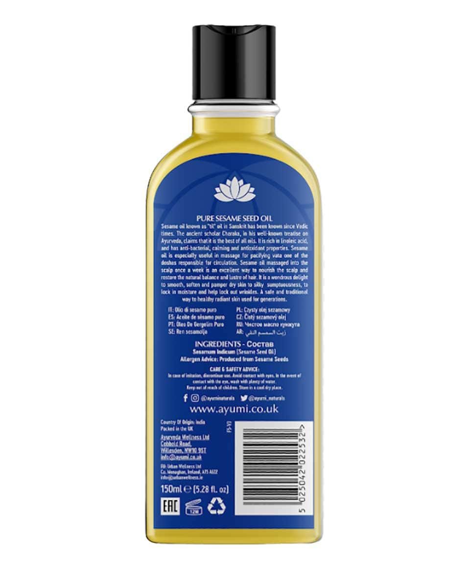 Ayumi Naturals pure sesame till seed oil bottle, natural hair treatment product with clear label, in a clean, minimalist setting.
