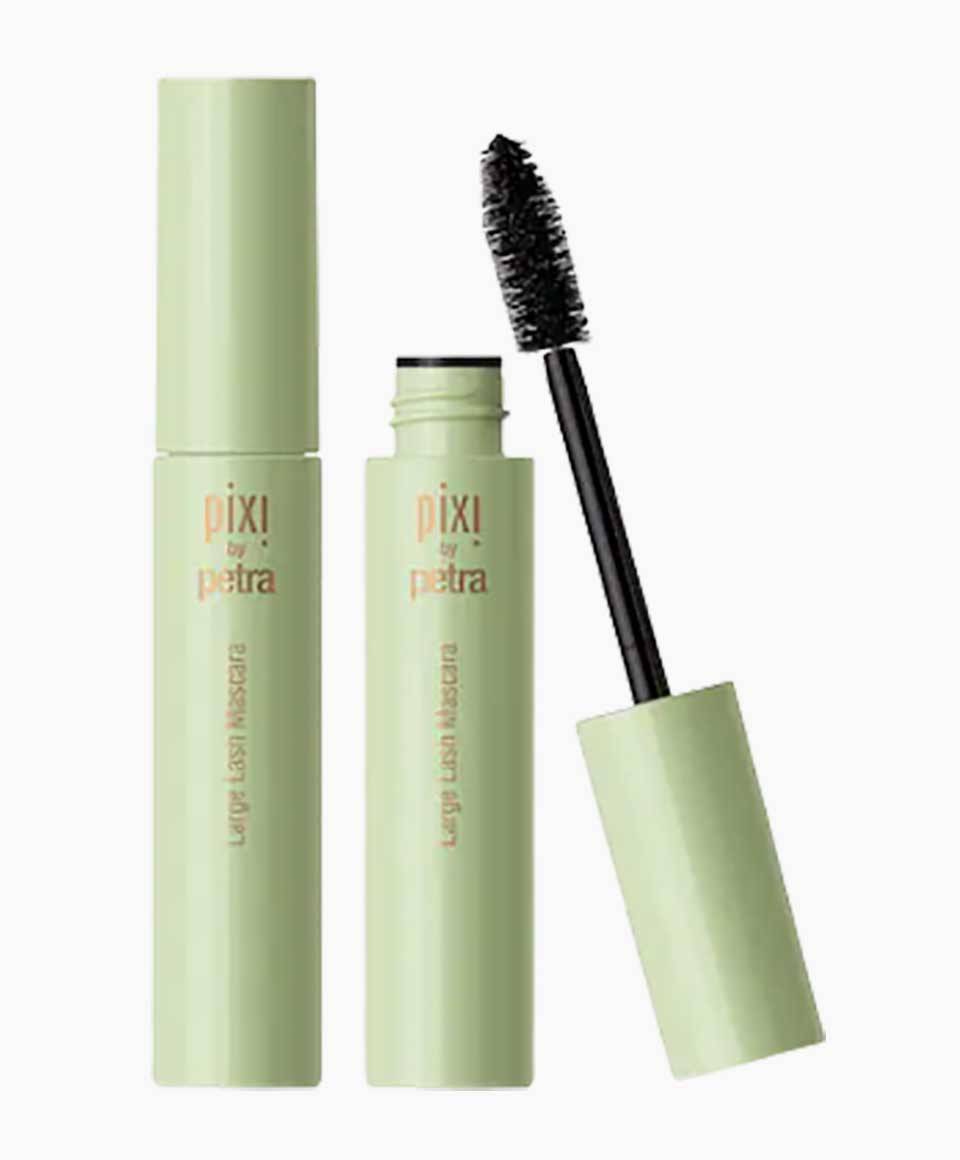 Pixi Large Lash Volumizing Mascara in Bold Black, eye makeup product with thick, lengthened lashes on a model.