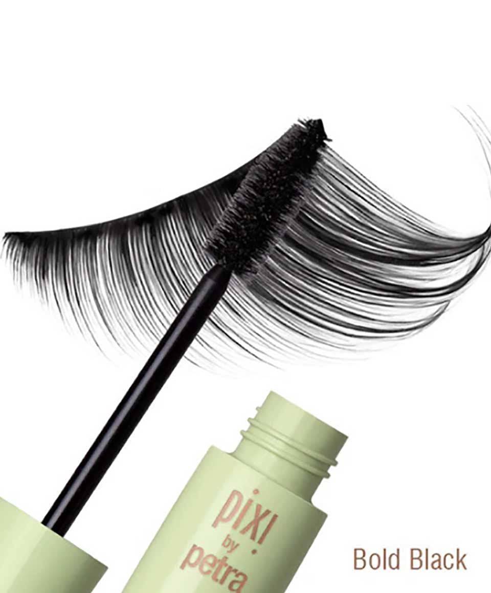 Close-up of Pixi Large Lash Volumizing Mascara in bold black, showing the mascara wand and eye makeup application.