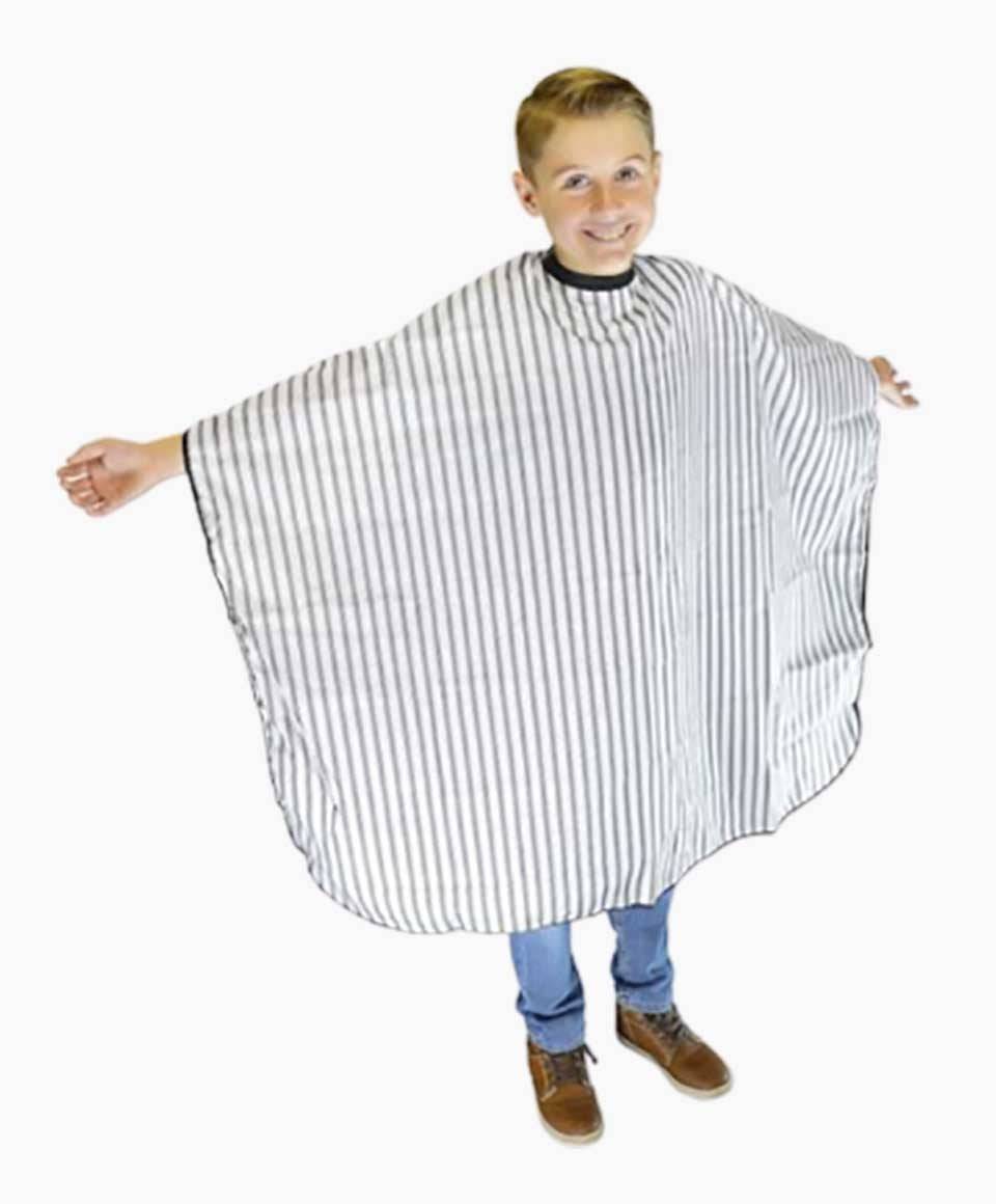 Black vintage barber cape for kids by DMI Professional Products, featuring classic white design and salon accessories.