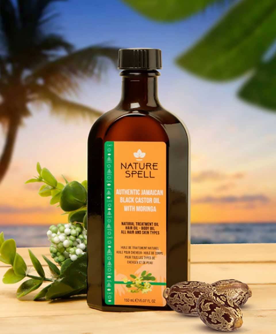 Nature Spell Jamaican Black Castor Oil with Moringa for hair treatment, featuring a dark bottle and natural ingredients.