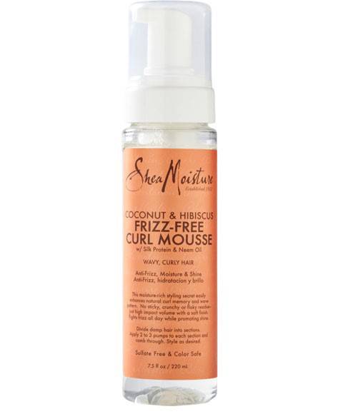 Shea Moisture Coconut and Hibiscus frizz-free curl mousse in a pump bottle, designed for enhancing natural curly hair.