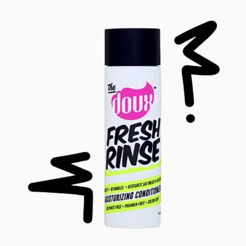 The Doux Fresh Rinse Moisturizing Conditioner bottle with label, showcasing its nourishing formula for healthy hair.