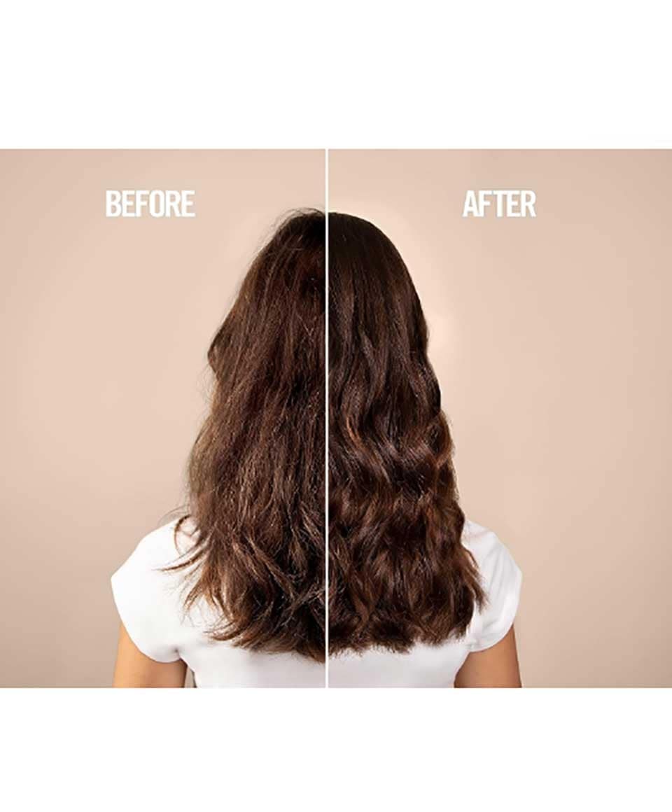 Revlon Uniq One All In One Hair Mask, a nourishing hair treatment in a sleek jar with a creamy texture.