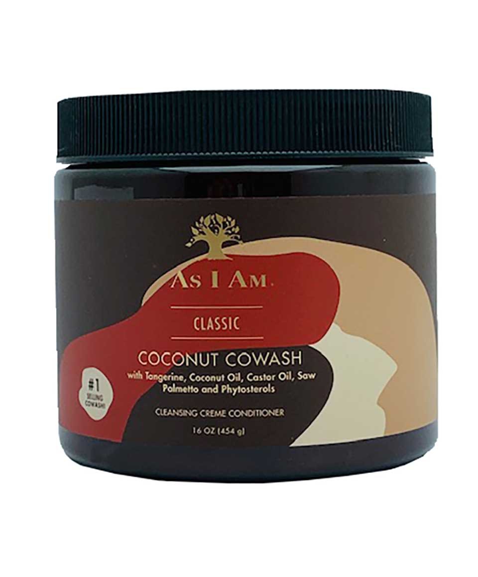 Creamy As I Am Coconut Cowash shampoo bottle with label visible, designed for gentle cleansing and hydration of curly hair.