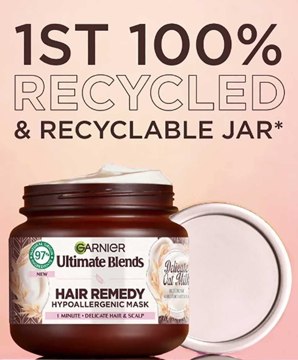 Garnier Ultimate Blends Delicate Oat Milk Hair Remedy Mask in a jar, creamy hair treatment for nourishing and repairing dry hair.