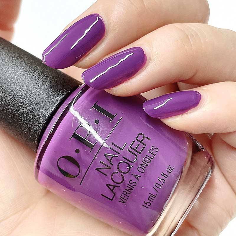 OPI Nail Lacquer in Violet Visionary, showcasing a rich purple shade in a sleek bottle with a brush applicator.