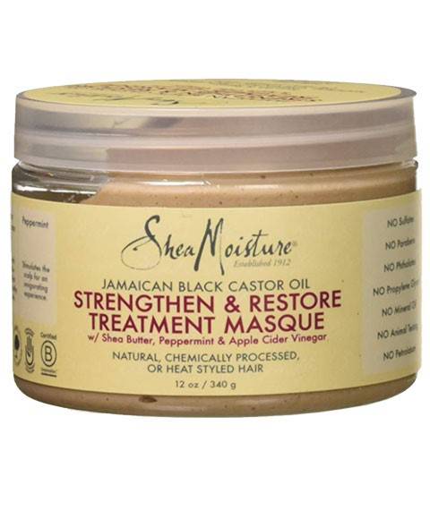 Shea Moisture Jamaican Black Castor Oil Treatment Masque for hair repair and deep conditioning, in a jar with creamy texture.