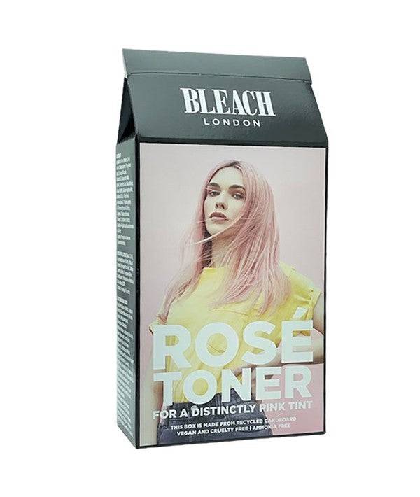Bleach London Rose Toner for hair, showcasing a vibrant pink hair color applied to styled hair.