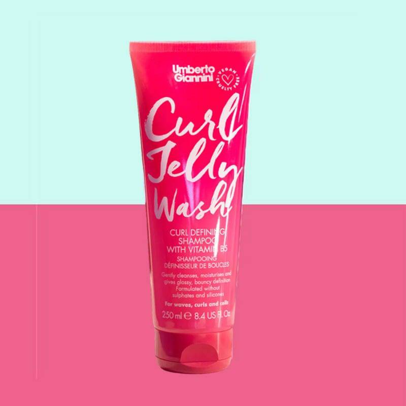 Umberto Giannini Curl Jelly Wash curl defining shampoo with Vitamin B5, showing the shampoo bottle with label and cap.