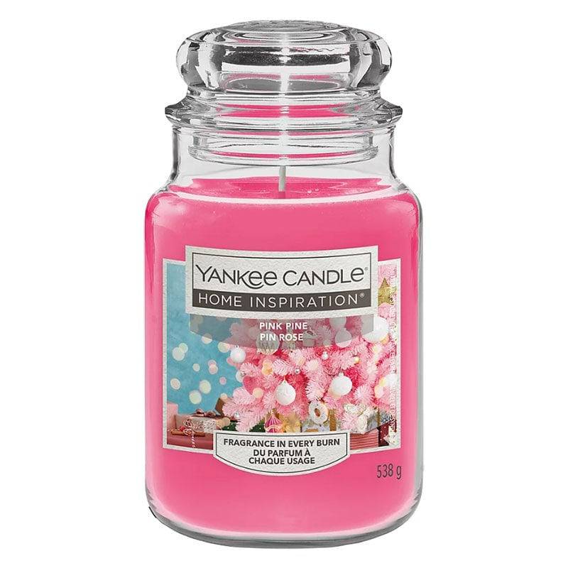 Yankee Candle Pink Pine home fragrance with a pink and green pine cone design, perfect for adding a cozy scent to your space