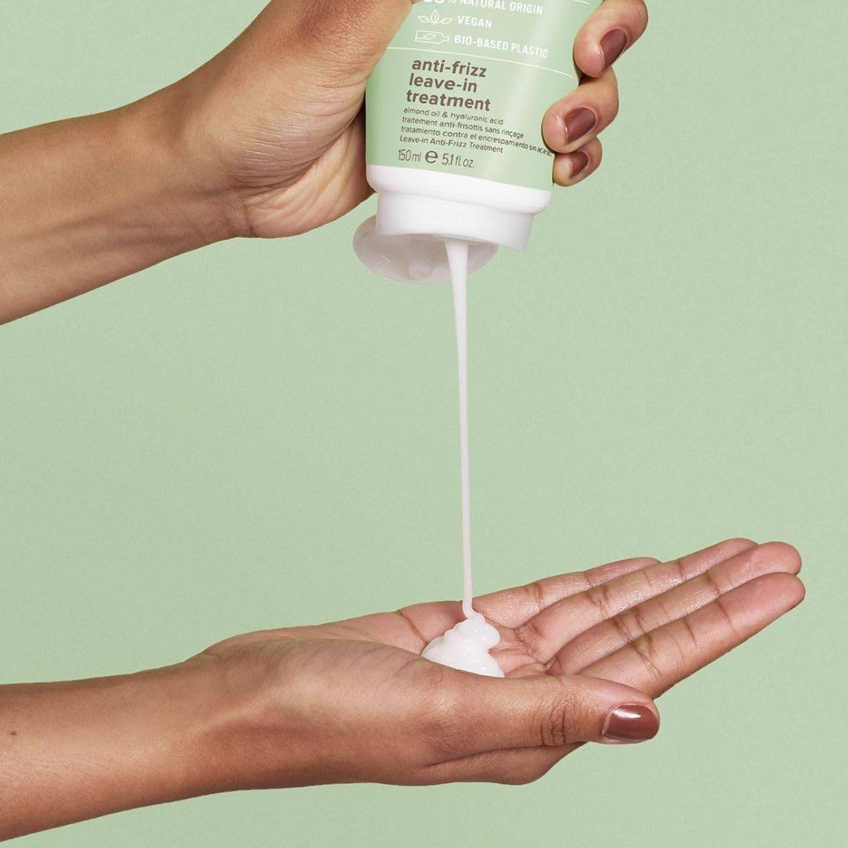 Paul Mitchell Clean Beauty Anti-Frizz Leave-In Conditioner bottle with sleek packaging, designed to smooth and control frizz.