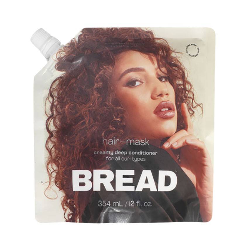 Creamy Bread Deep Conditioner hair mask for nourishing hair treatment, shown in a jar with smooth, rich texture.