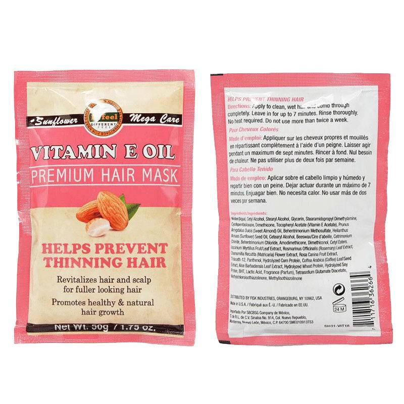 Difeel Vitamin E Oil premium hair mask in a jar, showing the nourishing hair treatment with natural ingredients and vibrant packaging.