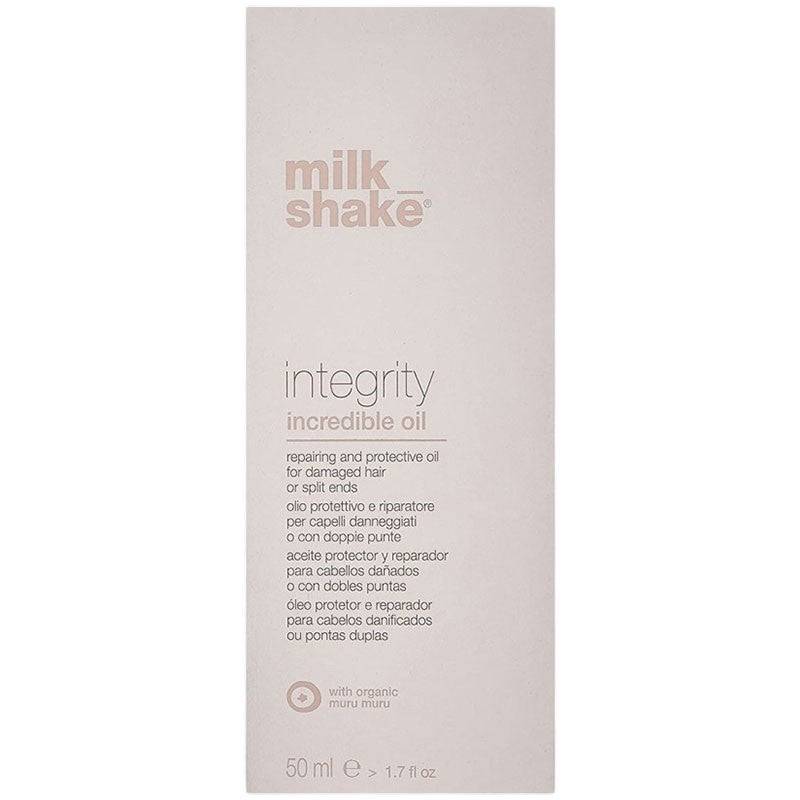 Milk Shake Integrity Incredible Oil hair treatment bottle with pump for nourishing hair care.
