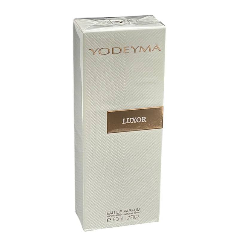Yodeyma Luxor Eau De Parfum for Her, elegant glass bottle with floral and citrus scent, showcasing luxury perfume packaging.
