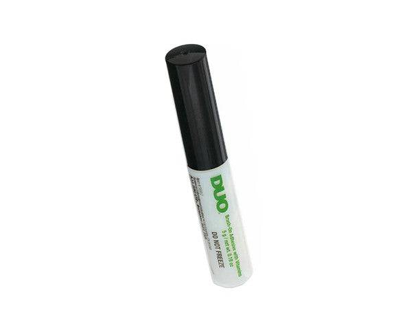 Duo Brush On Striplash Adhesive for eyelash extensions by American International Industries, close-up of the adhesive brush.