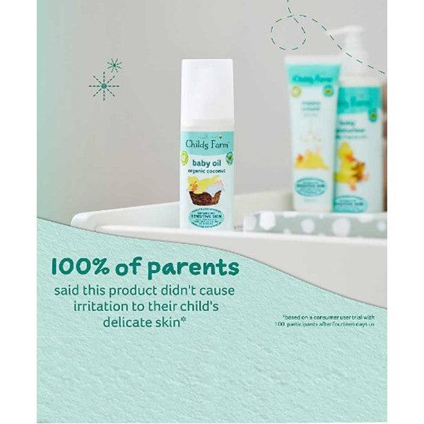 Childs Farm baby oil with organic coconut, soothing skin moisturizer for babies, in a clear bottle with a pump dispenser.
