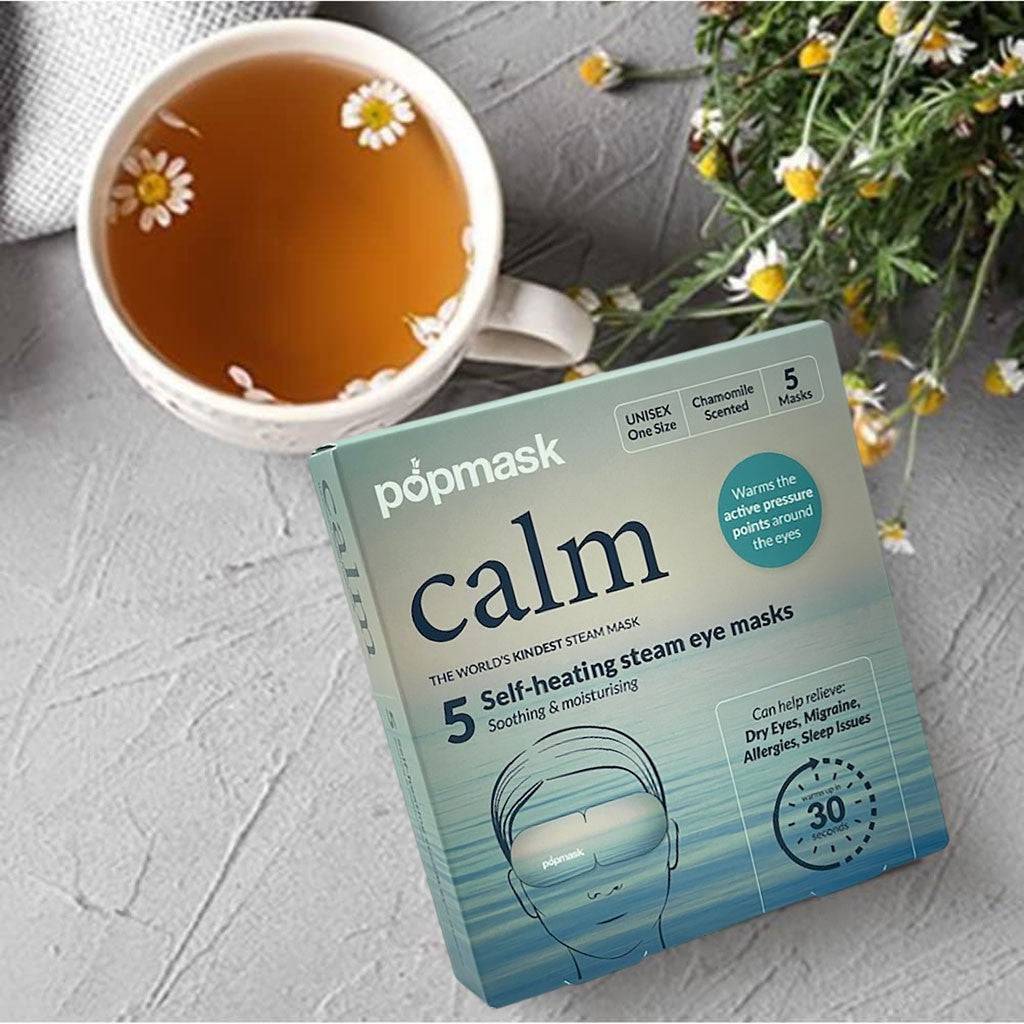 Pop Mask Calm 5 self-heating steam eye mask showing soft fabric and packaging for relaxing eye care.