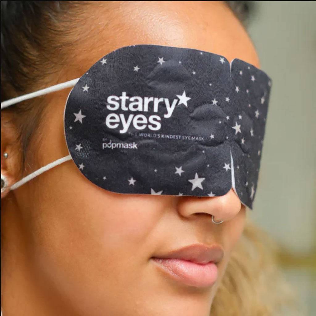 Pop Mask Starry Eyes self-heating steam eye mask for eye care, featuring a starry eye design and soft fabric for relaxation.