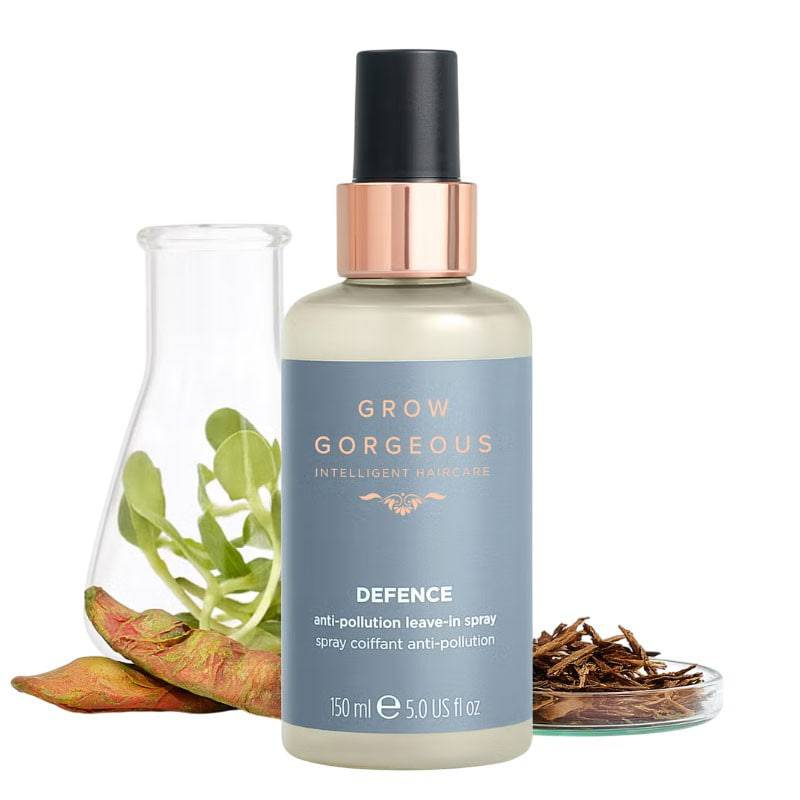 Grow Gorgeous Defense Leave-In Spray for hair treatment, featuring a spray bottle and hair care product in a natural setting.