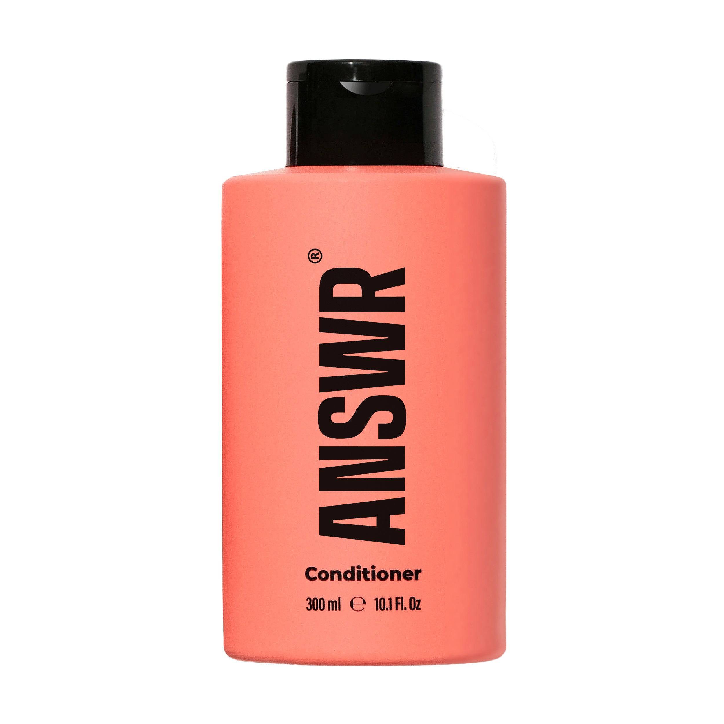 ANSWR Smoothing Conditioner bottle showing creamy conditioner formula in a sleek, minimalist bottle with a pump dispenser.
