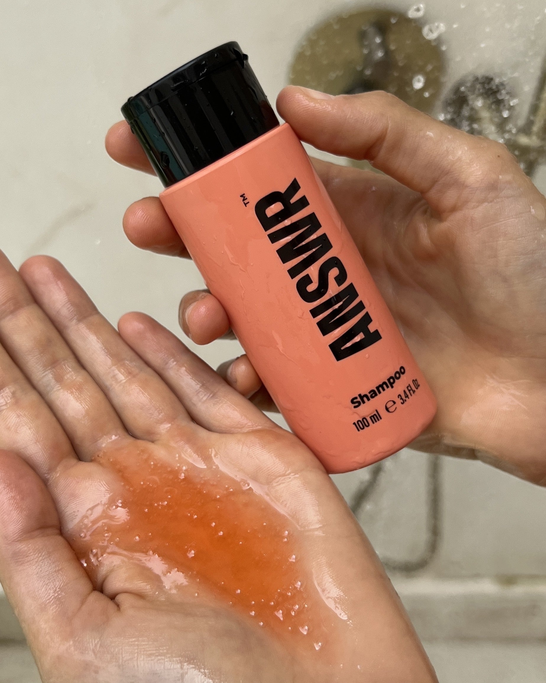 ANSWR Smoothing Shampoo bottle with sleek design, showcasing the ANSWR brand and smooth hair care benefits.