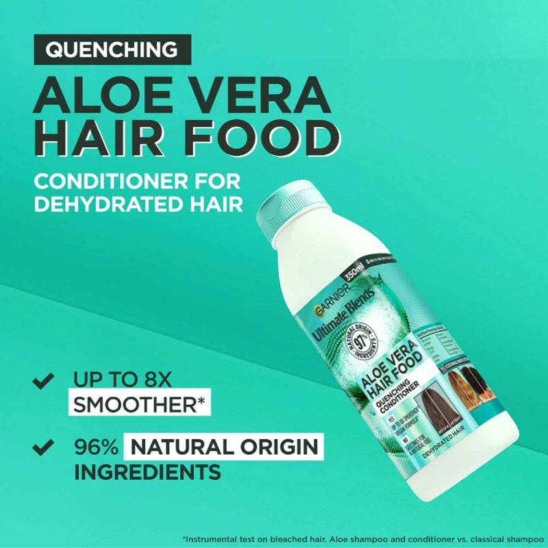 Garnier Ultimate Blends Aloe Vera Hair Food Quenching Conditioner bottle with green label and natural aloe vera imagery