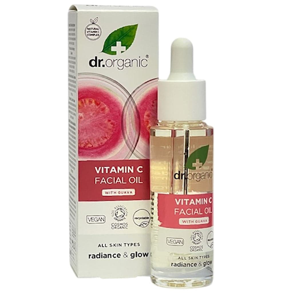 Dr Organic Organic Guava Brightening Facial Serum in a glass bottle with a dropper against a light background.