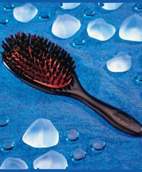 Denman Grooming Paddle Brush D82 for detangling and styling hair, with wide paddle design and natural bristles.