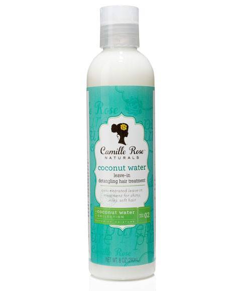 Camille Rose Naturals Coconut Water Leave-In Detangling Hair Treatment bottle with product label and natural hair background
