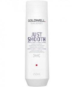 Goldwell Dualsenses Just Smooth Taming Shampoo bottle with gold and white packaging on a white background